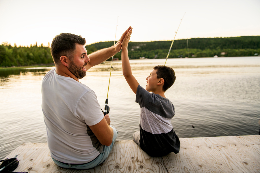 Cool Dad and son fishing on lake